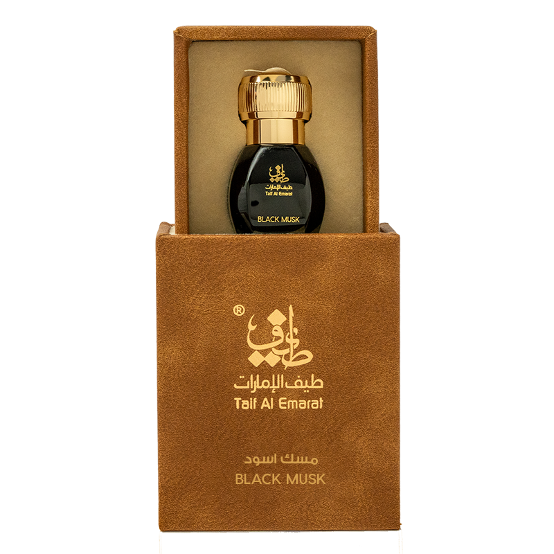 Extrait de musc noir Taif Al Emarat en 1 Tola, flacon avec parfum noir et design élégant.